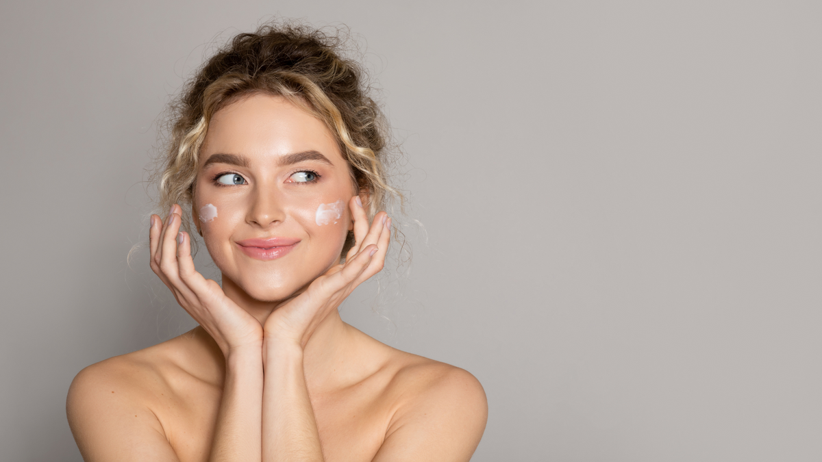woman with face cream